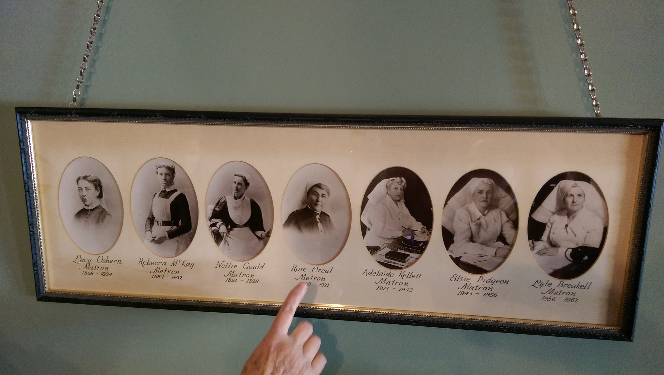 SYDNEY HOSPITAL MATRON WALL PHOTOS. MATRON ROSE CREAL POINTED TO IS THE MATRON WHO DIED IN 1921 WITH